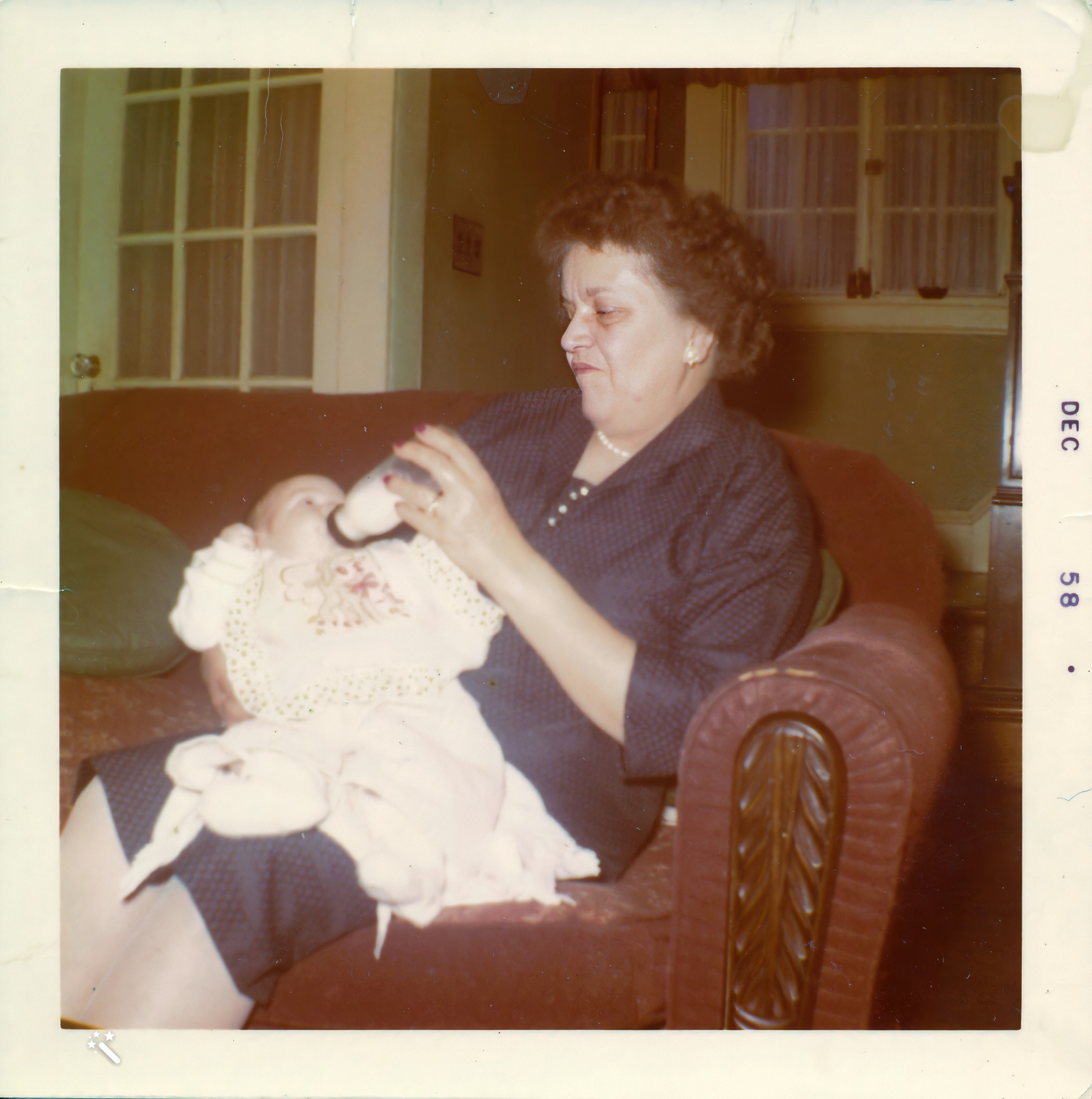 Edith feeding baby Patty