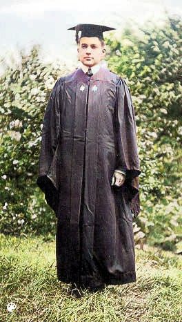 Philip wearing his graduation robe