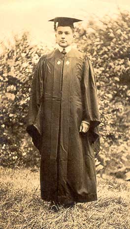 Philip wearing his graduation robe