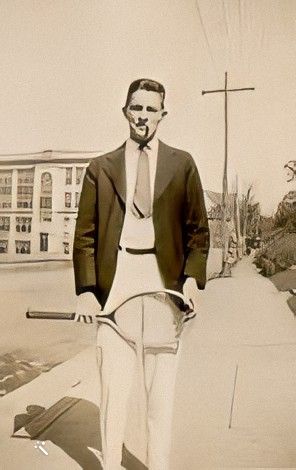 Philip standing with a tennis racket